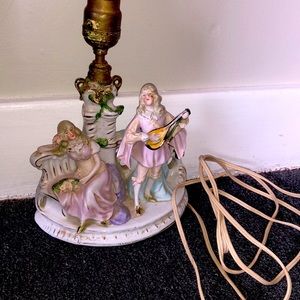 Lamp very old lamp with people on it